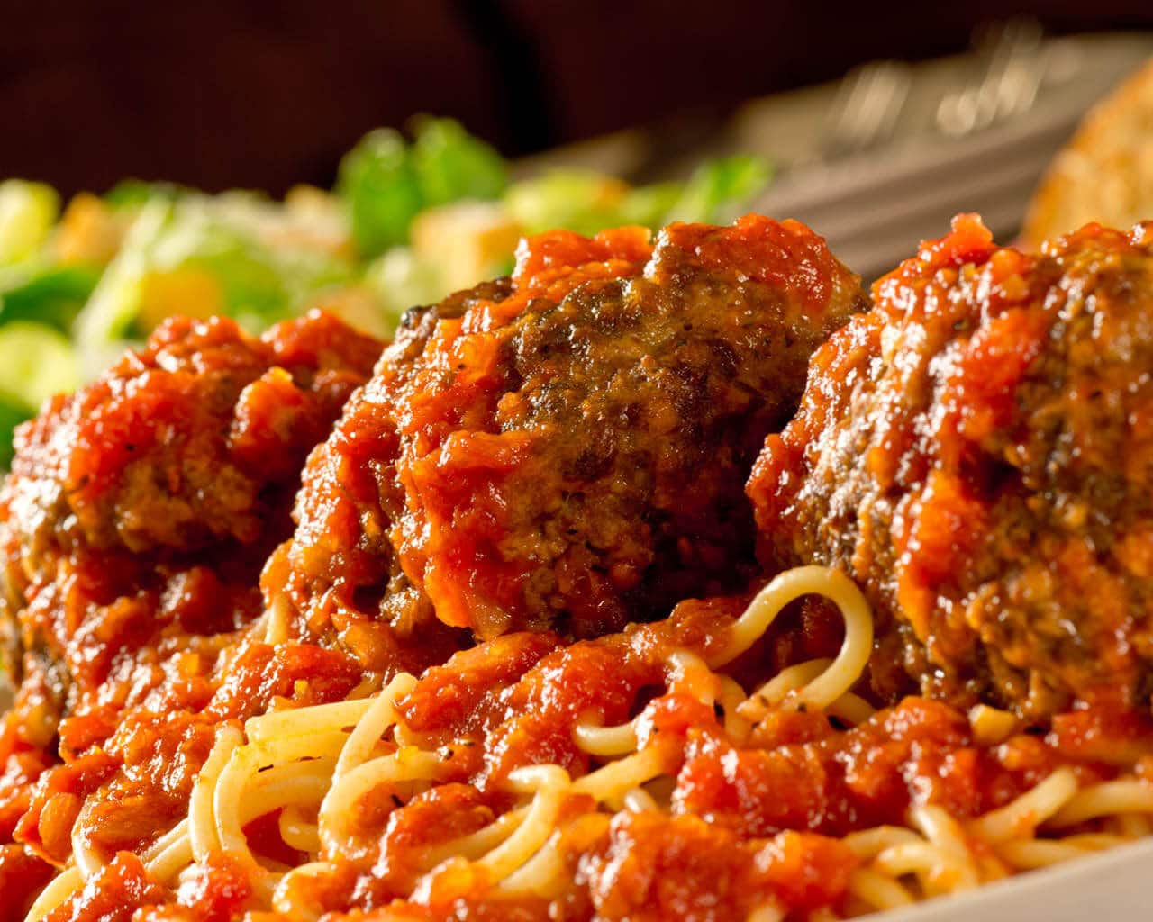 A close up of spaghetti and meatballs