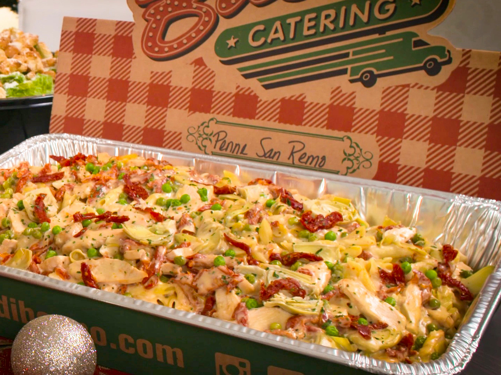Holiday Catering Pasta in pan with holiday decor from Buca di Beppo